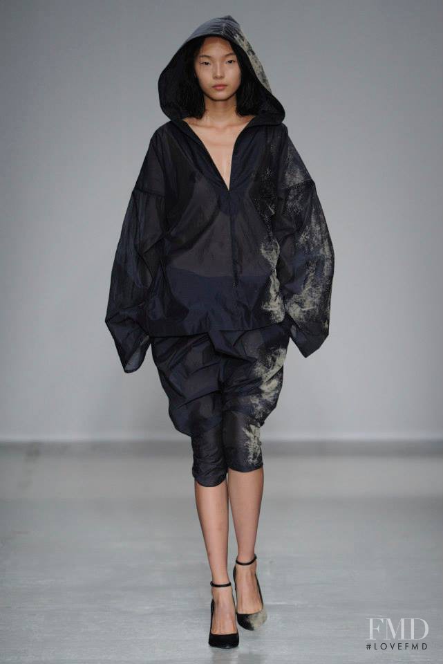 Xiao Wen Ju featured in  the A.F. Vandevorst fashion show for Spring/Summer 2014