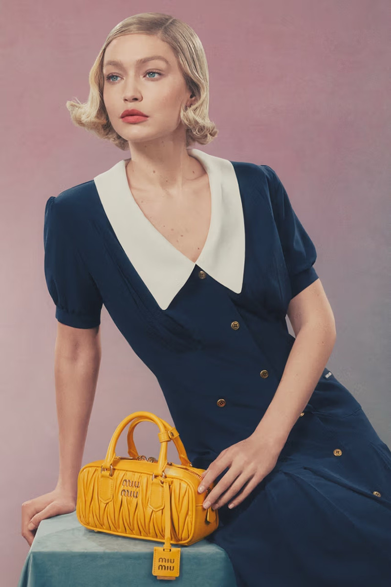 Gigi Hadid featured in  the Miu Miu wander handbag 2024 advertisement for Summer 2024