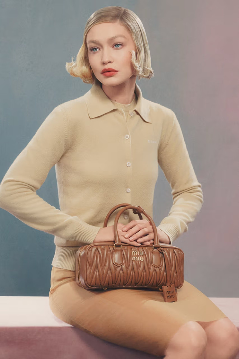 Gigi Hadid featured in  the Miu Miu wander handbag 2024 advertisement for Summer 2024