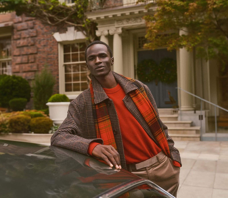 Malick Bodian featured in  the Banana Republic advertisement for Holiday 2024