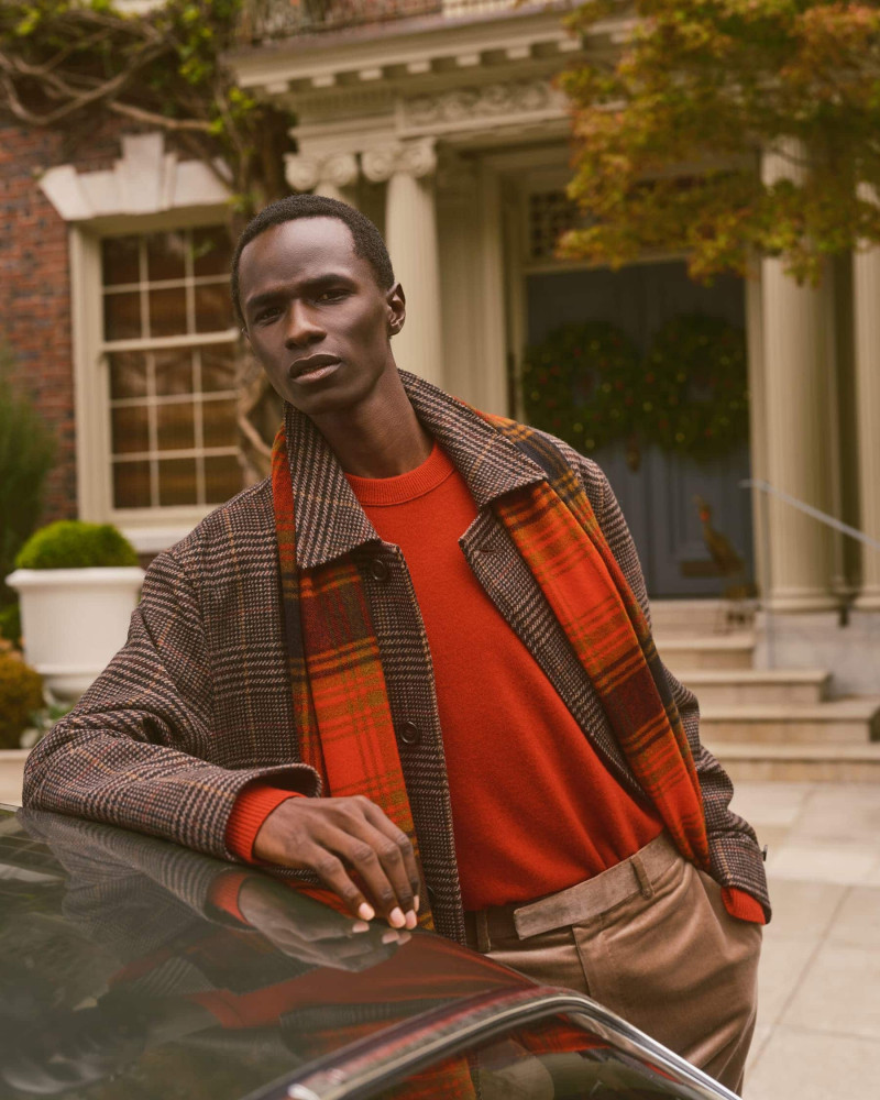 Malick Bodian featured in  the Banana Republic advertisement for Holiday 2024