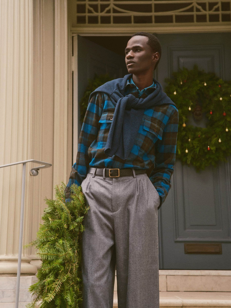 Malick Bodian featured in  the Banana Republic advertisement for Holiday 2024