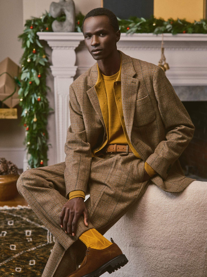 Malick Bodian featured in  the Banana Republic advertisement for Holiday 2024