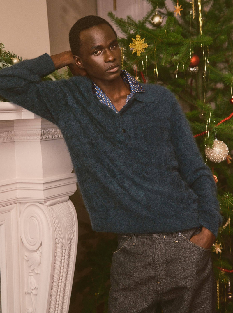 Malick Bodian featured in  the Banana Republic advertisement for Holiday 2024