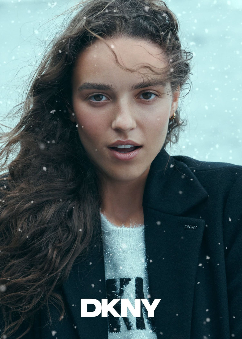 Emm Arruda featured in  the DKNY advertisement for Holiday 2024