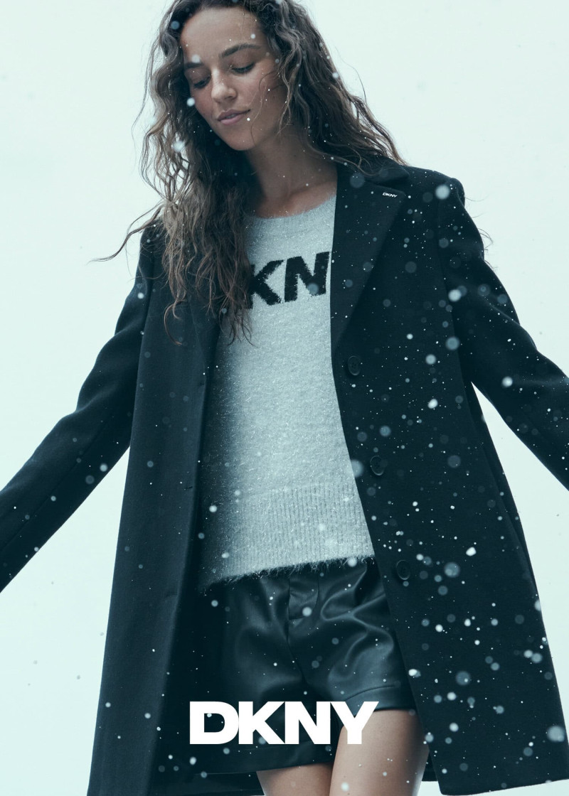 Emm Arruda featured in  the DKNY advertisement for Holiday 2024