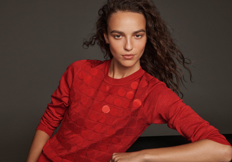 Emm Arruda featured in  the DKNY advertisement for Holiday 2024