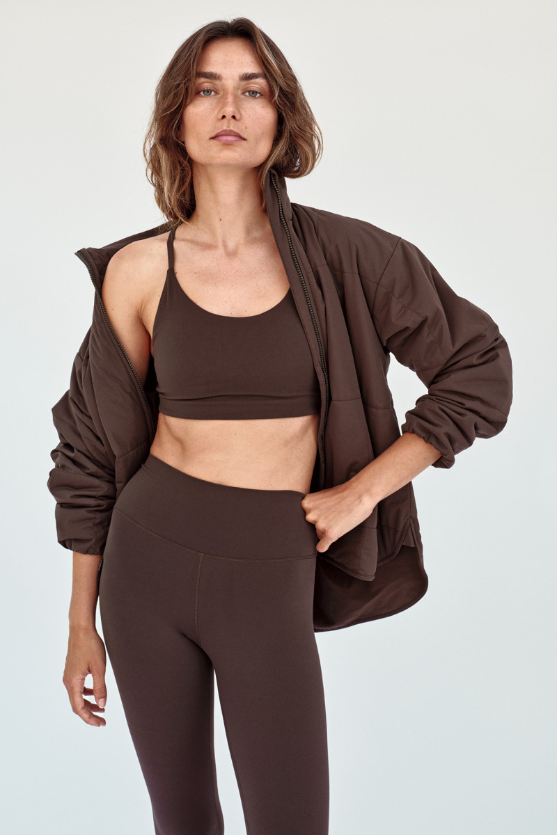 Andreea Diaconu featured in  the H&M Move H&M Wellness Edit advertisement for Spring 2025