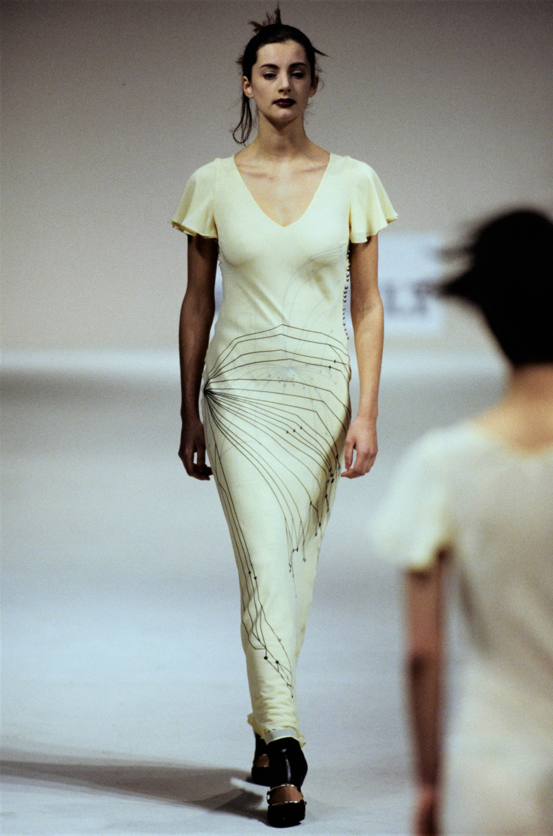 Honor Fraser featured in  the Hussein Chalayan fashion show for Autumn/Winter 1995