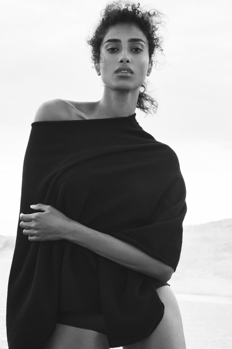Imaan Hammam featured in  the DKNY Cashmere Mist Collection advertisement for Spring 2025