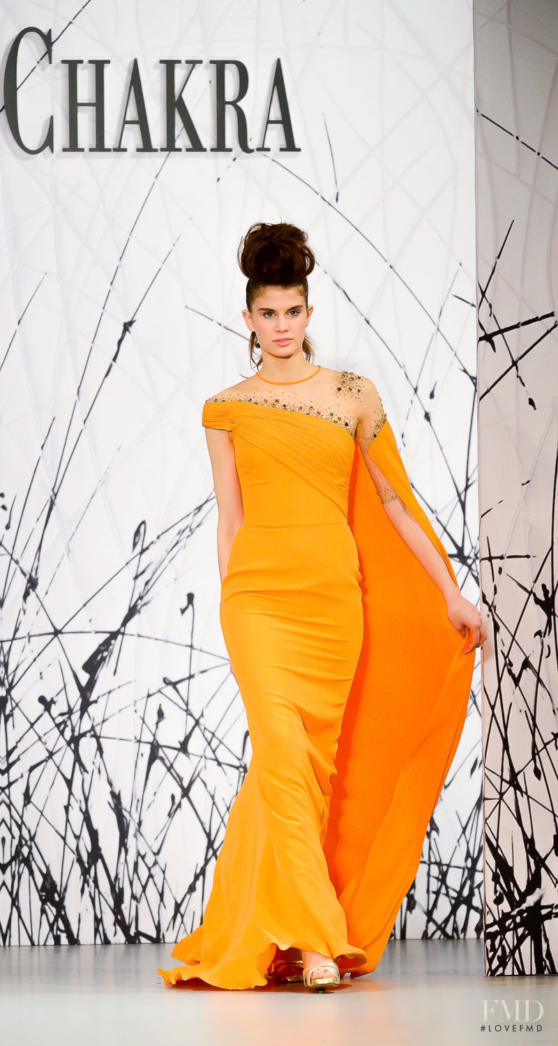 Livia Pillmann featured in  the Georges Chakra fashion show for Spring/Summer 2014