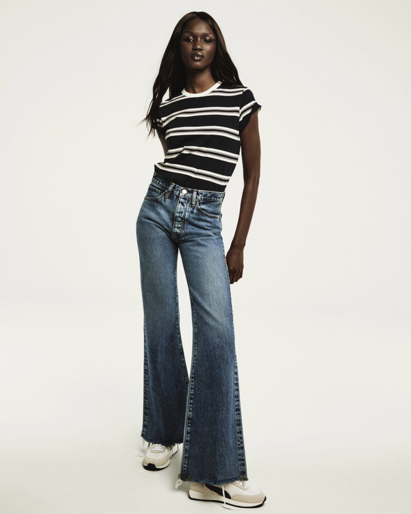 Abeny Nhial featured in  the Frame Denim advertisement for Spring 2025