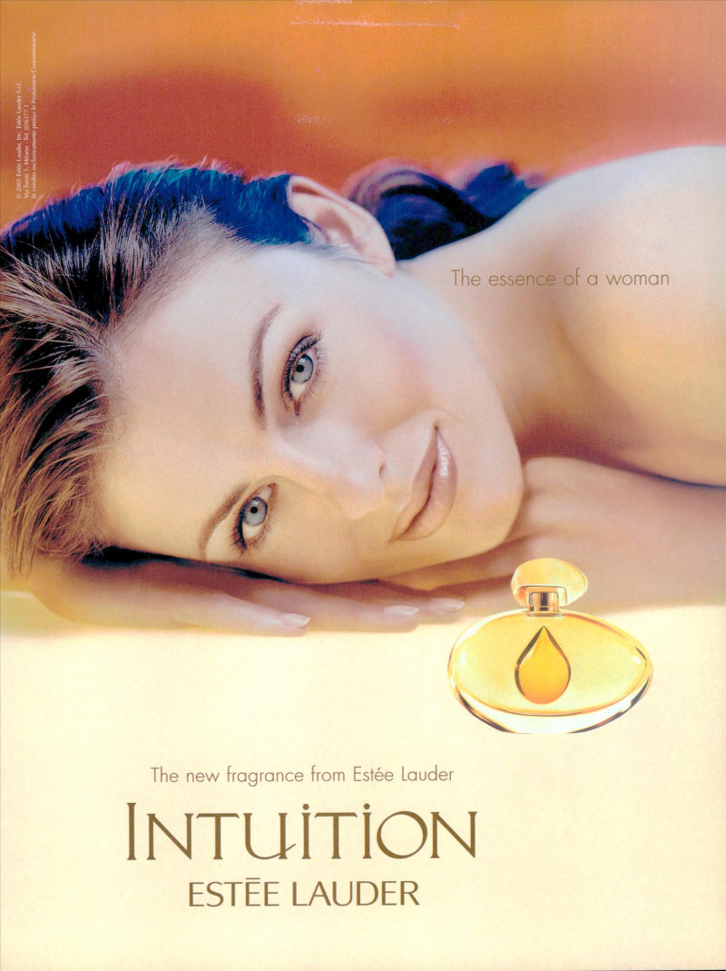 Elizabeth Hurley featured in  the Estée Lauder Intuition Fragrance advertisement for Spring/Summer 2000