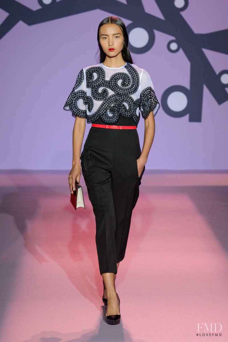 Luping Wang featured in  the Andrew Gn fashion show for Spring/Summer 2015