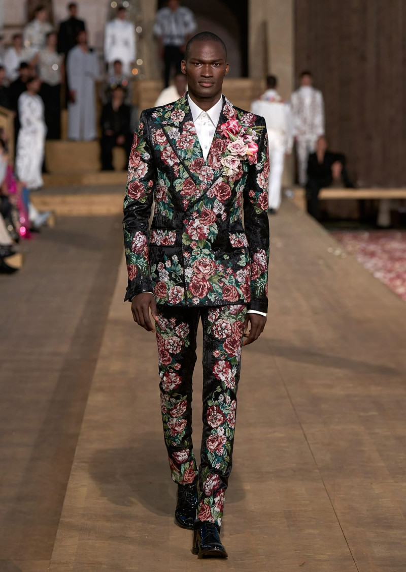 Yves Diatta featured in  the Dolce & Gabbana Alta Moda fashion show for Summer 2024
