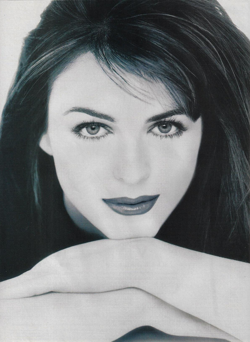 Elizabeth Hurley featured in  the Estée Lauder advertisement for Pre-Fall 1998