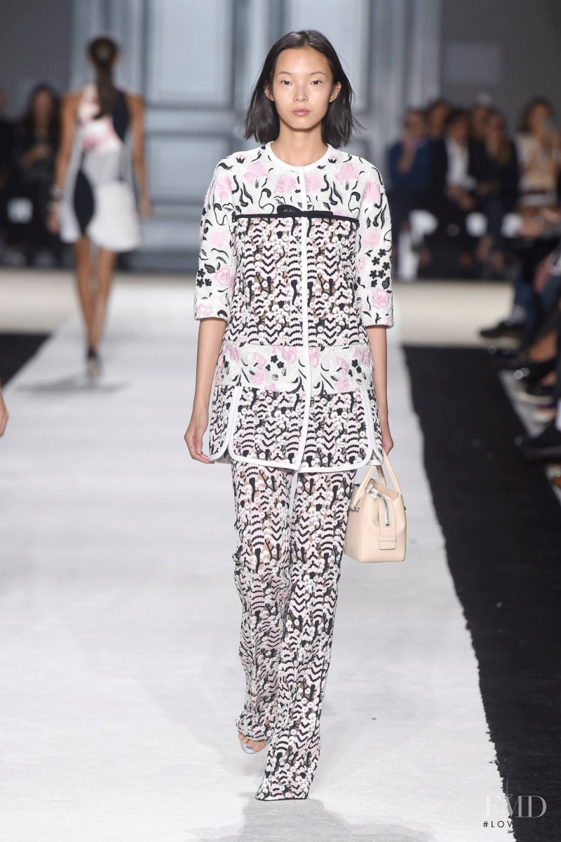 Xiao Wen Ju featured in  the Giambattista Valli fashion show for Spring/Summer 2015