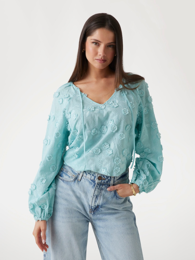 Kianna Louise Stephens featured in  the Guess catalogue for Spring/Summer 2025