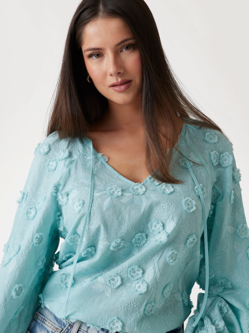 Kianna Louise Stephens featured in  the Guess catalogue for Spring/Summer 2025