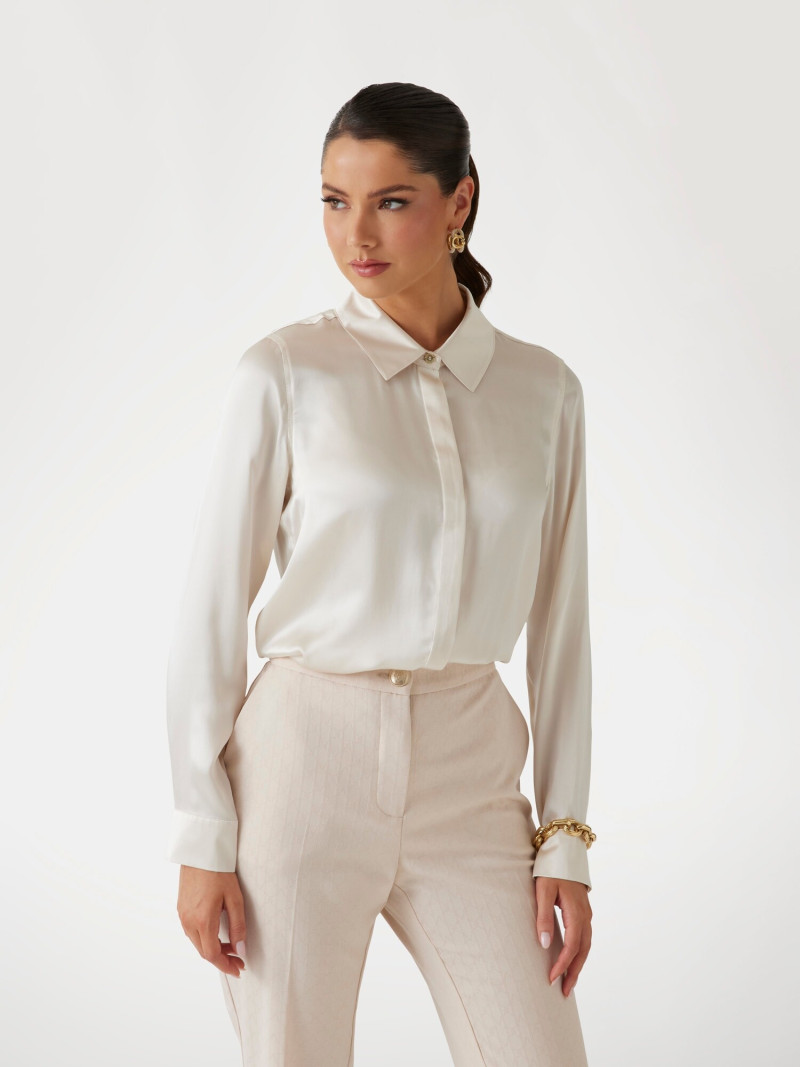 Kianna Louise Stephens featured in  the Guess catalogue for Summer 2025