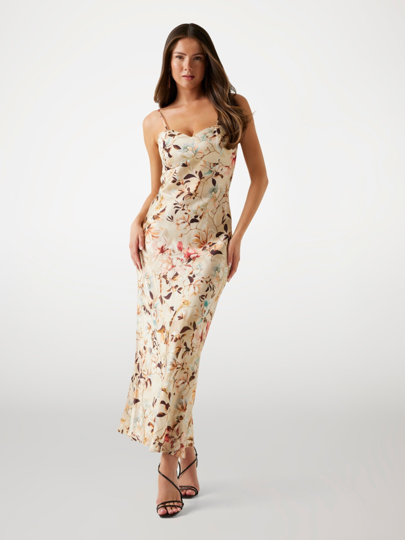 Kianna Louise Stephens featured in  the Guess catalogue for Summer 2025
