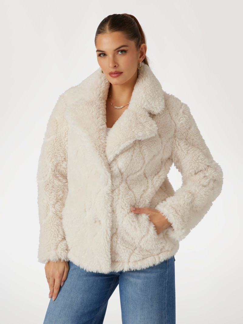 Seyla Brigitte Zanon featured in  the Guess catalogue for Pre-Fall 2025