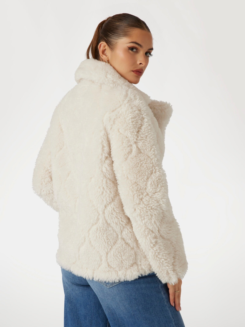 Seyla Brigitte Zanon featured in  the Guess catalogue for Pre-Fall 2025
