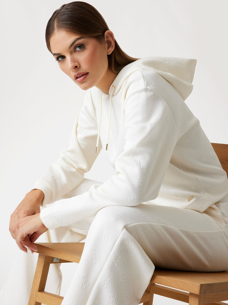 Seyla Brigitte Zanon featured in  the Guess catalogue for Pre-Fall 2025