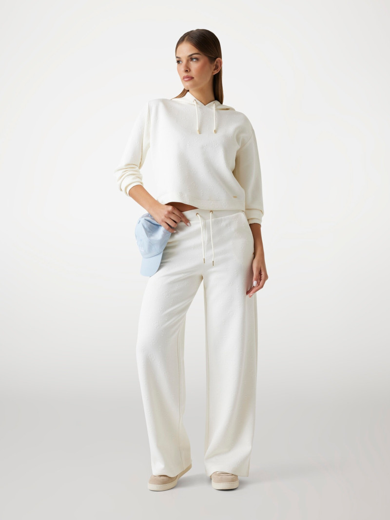 Seyla Brigitte Zanon featured in  the Guess catalogue for Pre-Fall 2025