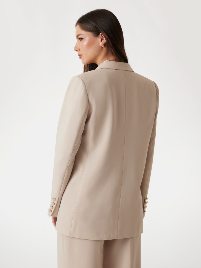 Kianna Louise Stephens featured in  the Guess catalogue for Pre-Fall 2025