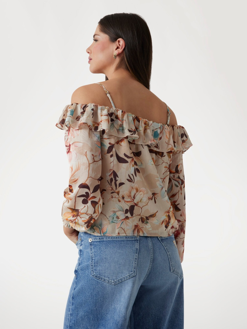 Kianna Louise Stephens featured in  the Guess catalogue for Pre-Fall 2025