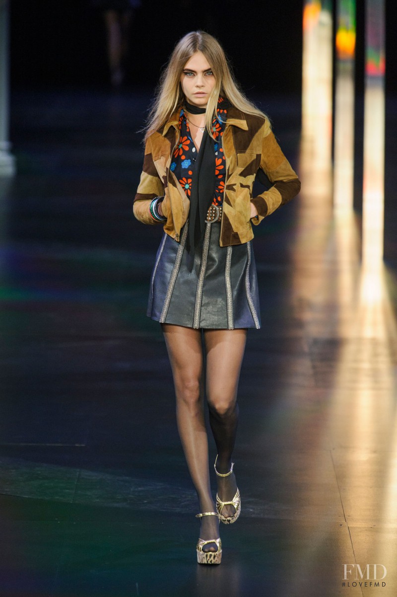 Cara Delevingne featured in  the Saint Laurent fashion show for Spring/Summer 2015