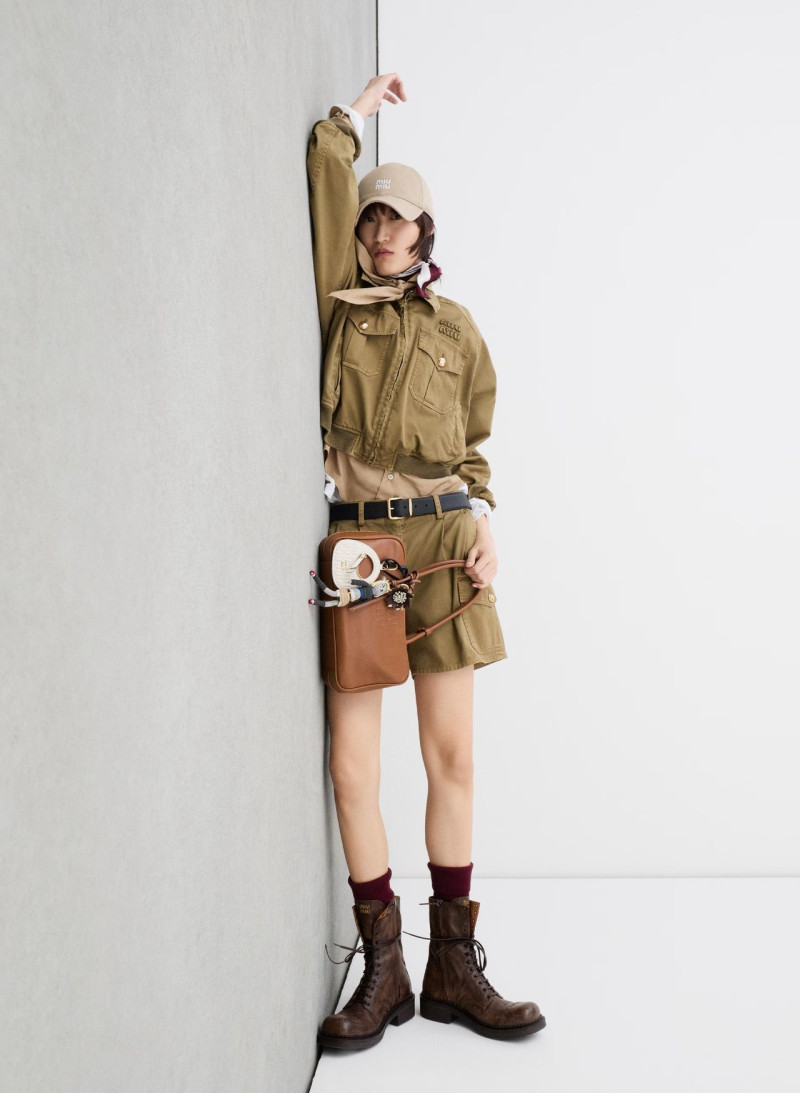 Yura Romaniuk featured in  the Miu Miu lt 2025 advertisement for Spring/Summer 2025