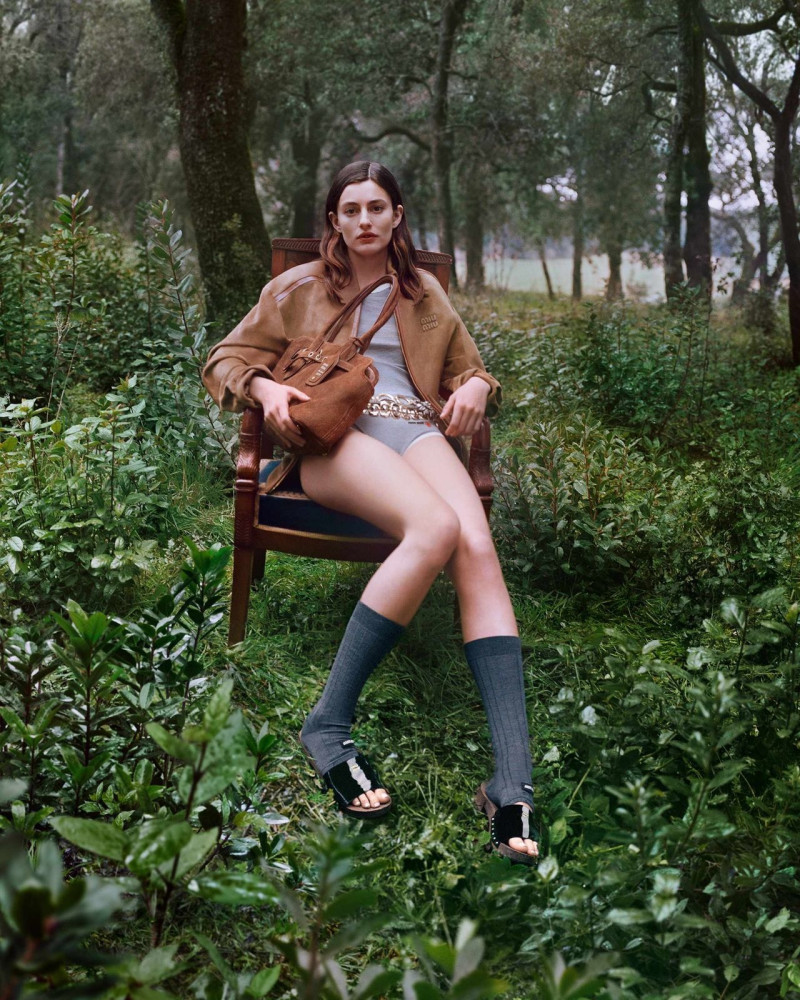 Yura Romaniuk featured in  the Miu Miu lt 2025 advertisement for Spring/Summer 2025