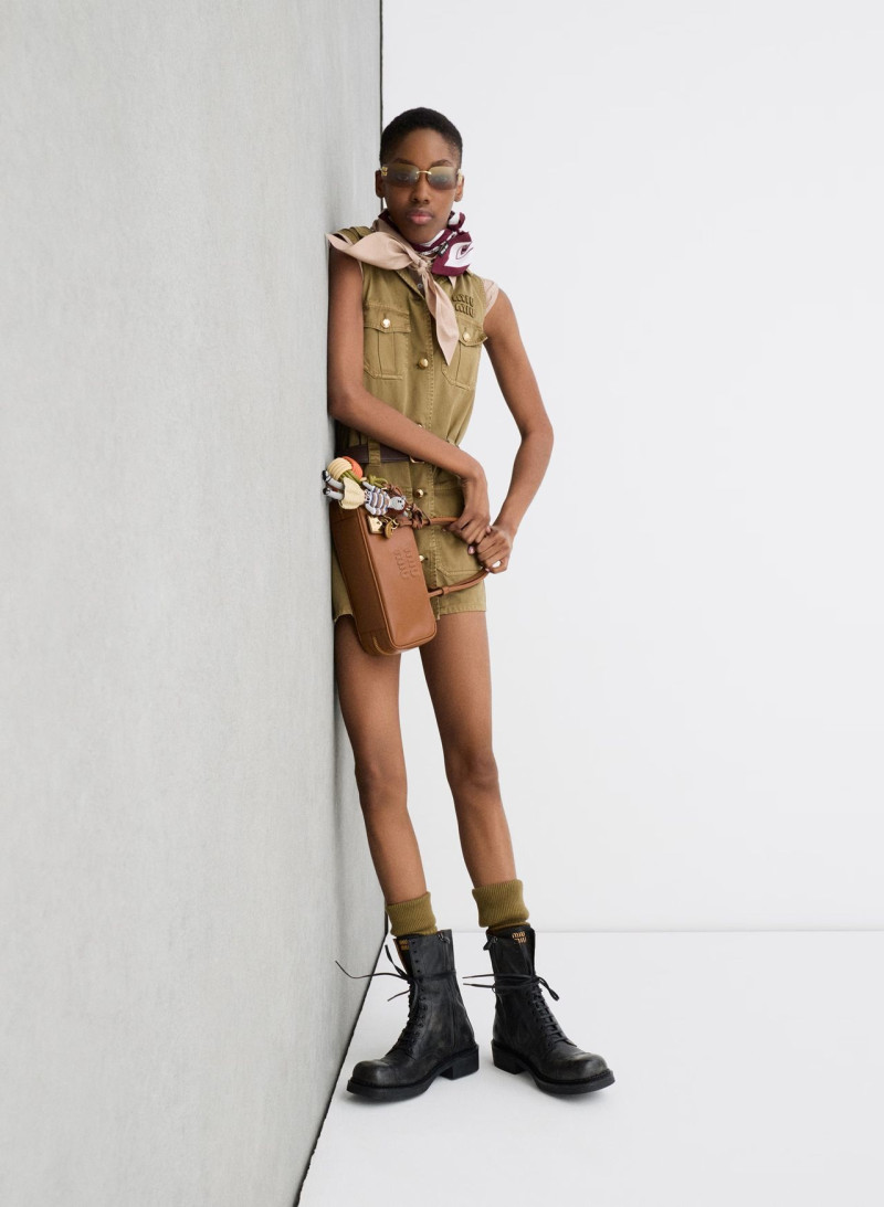 Yura Romaniuk featured in  the Miu Miu lt 2025 advertisement for Spring/Summer 2025