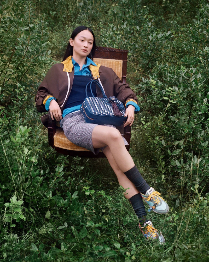 Yura Romaniuk featured in  the Miu Miu lt 2025 advertisement for Spring/Summer 2025