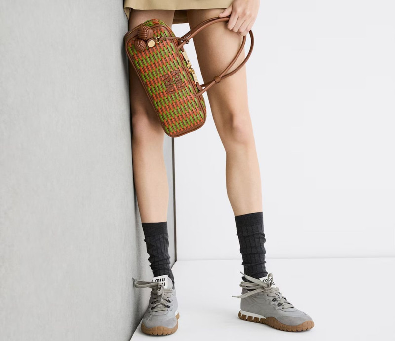 Yura Romaniuk featured in  the Miu Miu lt 2025 advertisement for Spring/Summer 2025