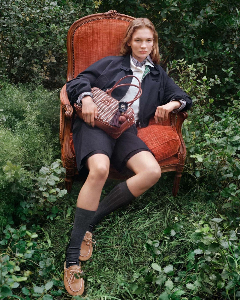 Yura Romaniuk featured in  the Miu Miu lt 2025 advertisement for Spring/Summer 2025