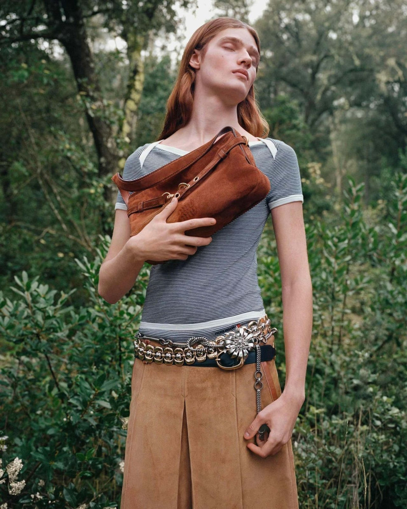 Yura Romaniuk featured in  the Miu Miu lt 2025 advertisement for Spring/Summer 2025