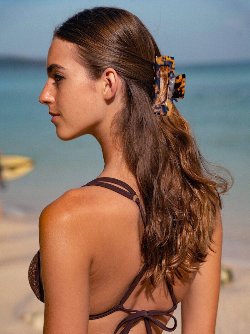 Emily Feld featured in  the San Rini Swim lookbook for Summer 2025