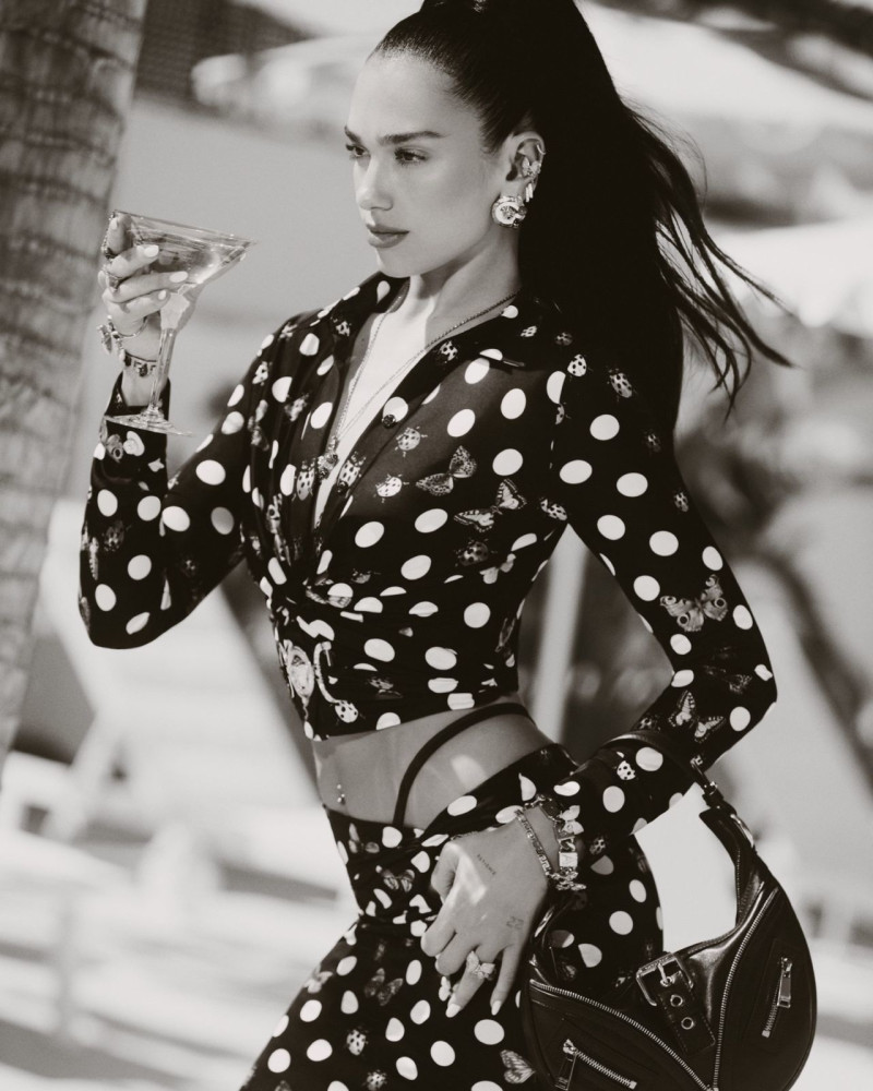 Dua Lipa featured in  the Versace La Vacanza advertisement for Pre-Fall 2023