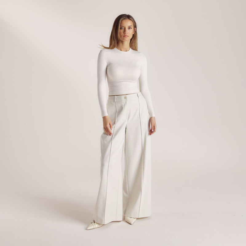 Nicola Cavanis featured in  the Lounge lookbook for Holiday 2024