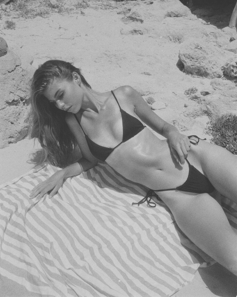Sam De Laat featured in  the Dua Swimwear advertisement for Spring/Summer 2022