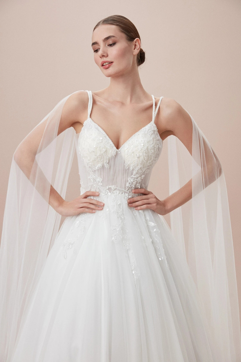 Alexandra Pletnyova featured in  the Oleg Cassini lookbook for Spring/Summer 2023