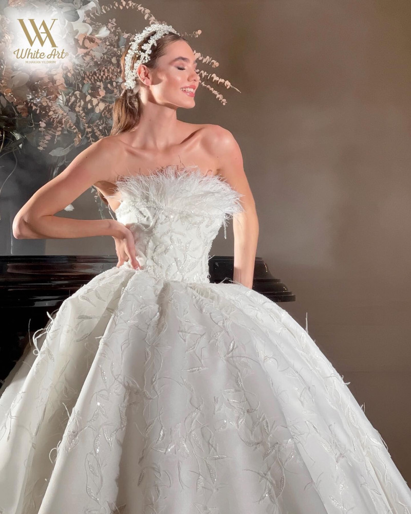 Alexandra Pletnyova featured in  the White Art Bridal lookbook for Winter 2022
