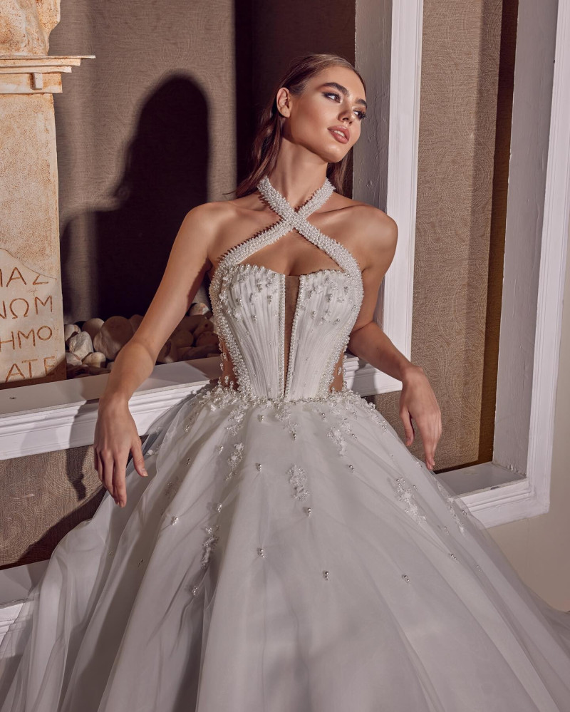 Alexandra Pletnyova featured in  the White Art Bridal lookbook for Winter 2022