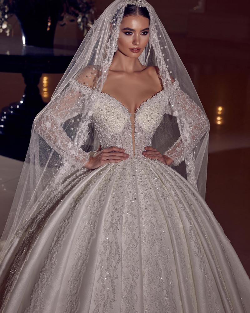 Alexandra Pletnyova featured in  the White Art Bridal lookbook for Winter 2022