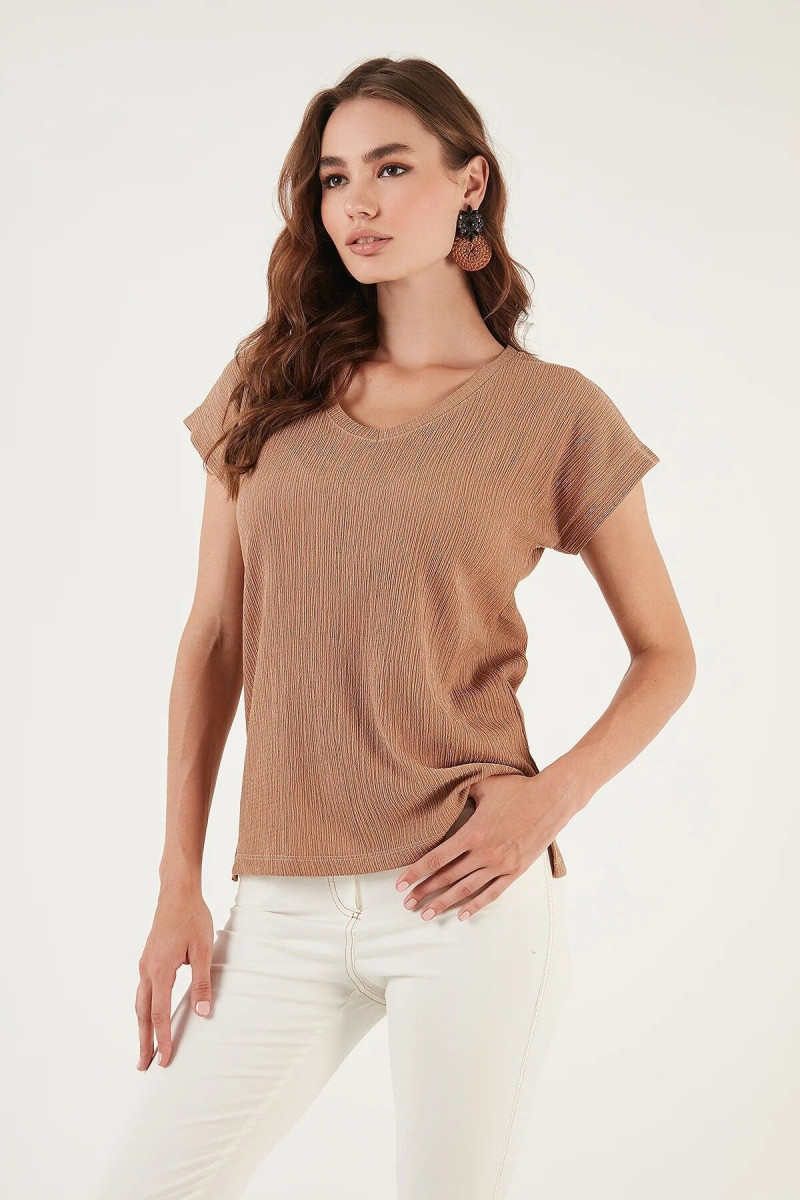 Alexandra Pletnyova featured in  the Lela catalogue for Spring/Summer 2025