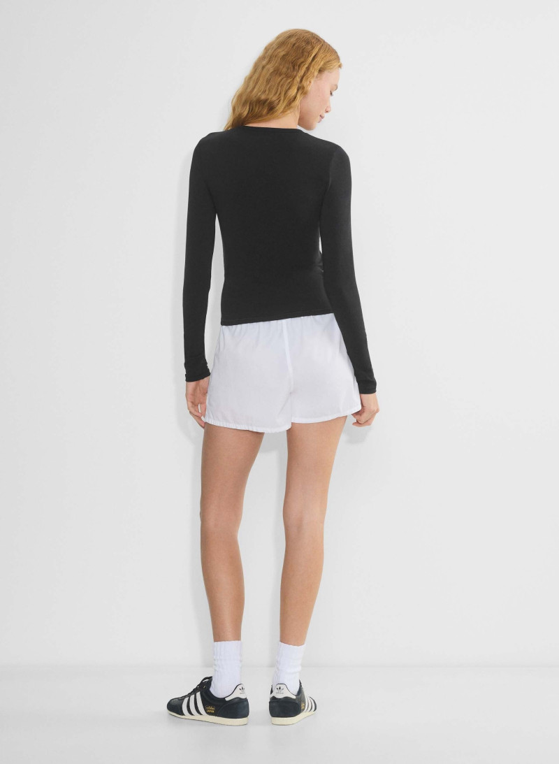 Tess Summer Carter featured in  the Aritzia catalogue for Spring/Summer 2025