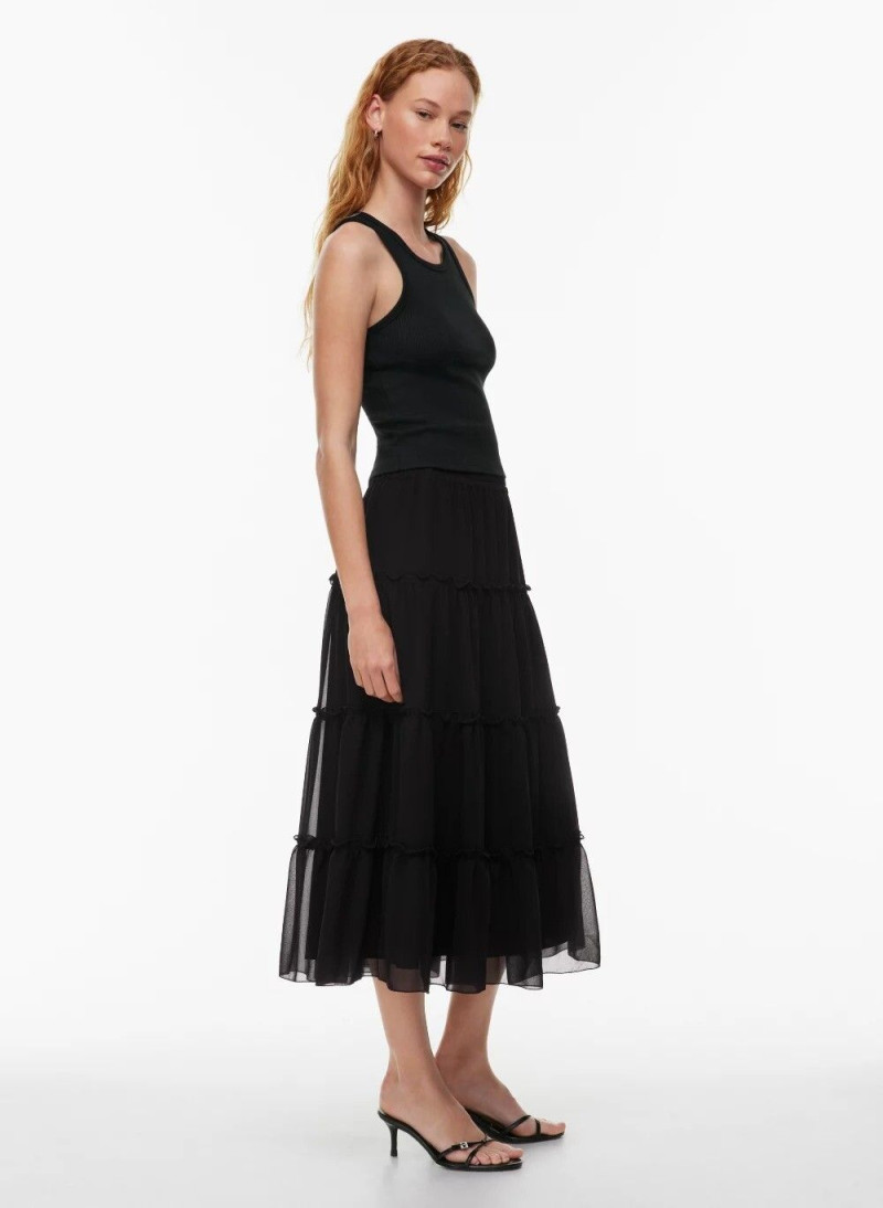Tess Summer Carter featured in  the Aritzia catalogue for Spring/Summer 2024